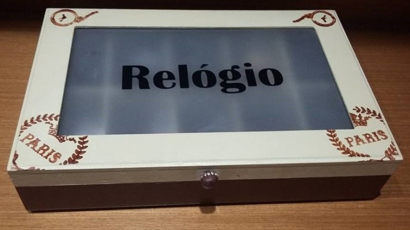 Porta Relógio