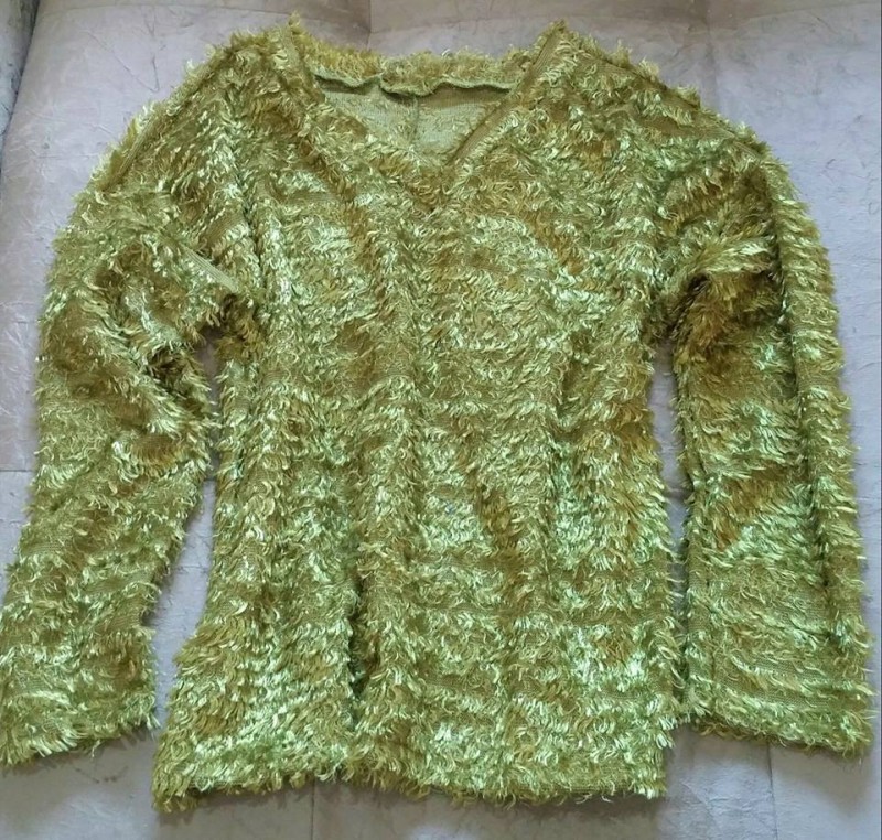 Blusa felpuda, Tam G