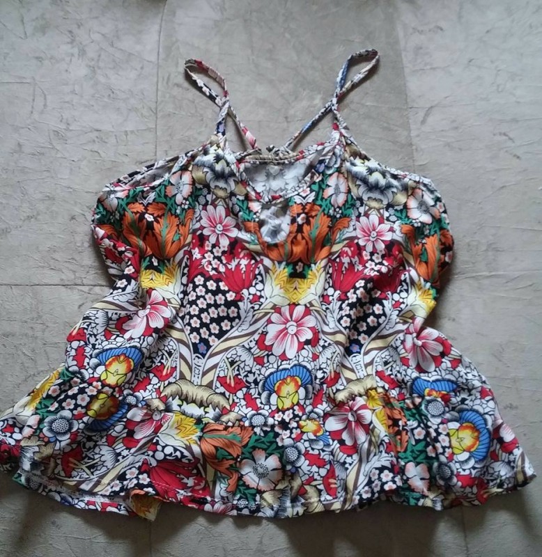 Blusa estampada com babado na barra, Tam M